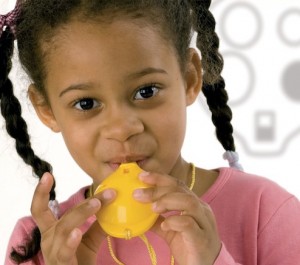 Young girl playing the Ocarina